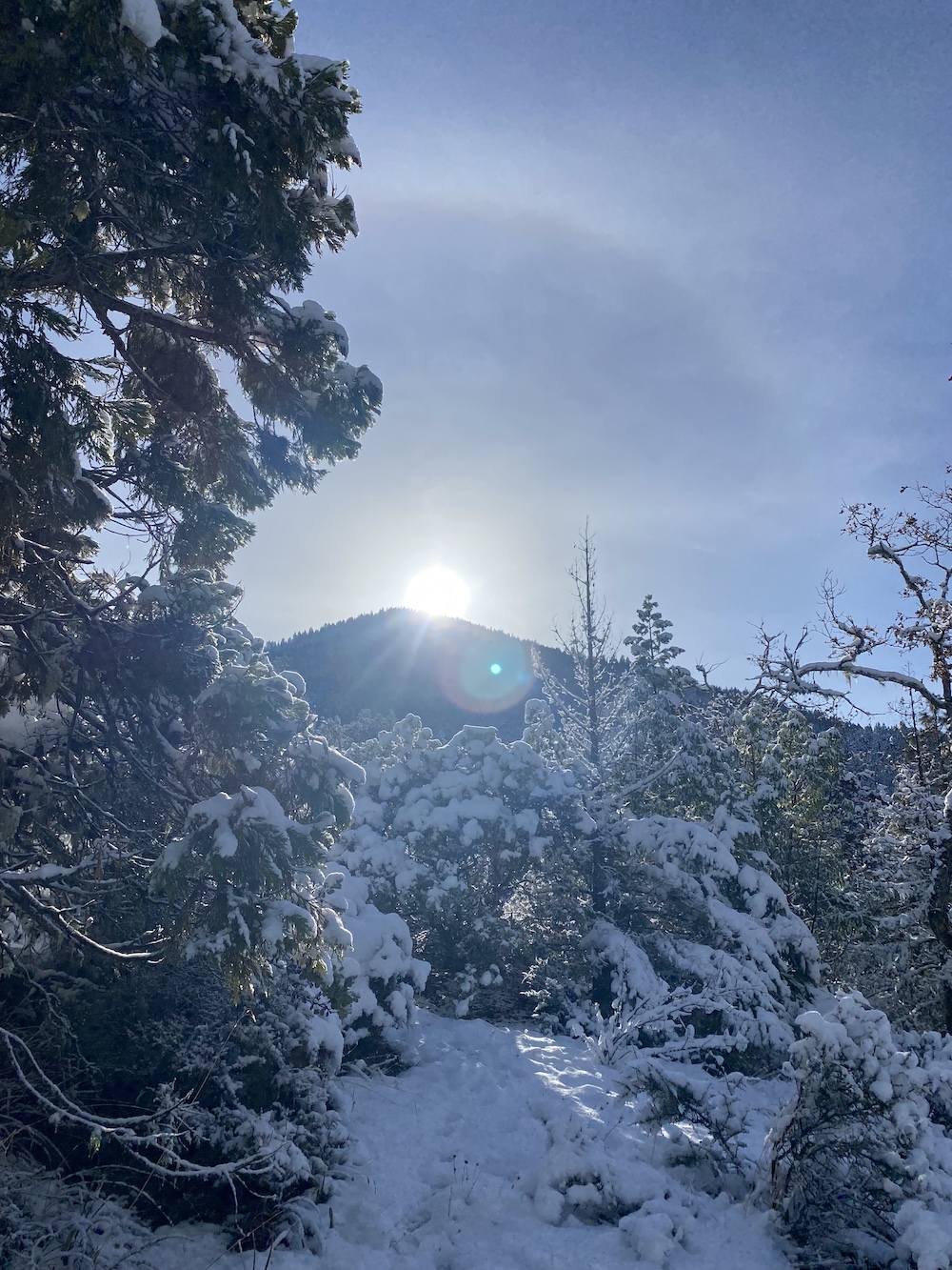 Hope Mountain in snow with the sun rising